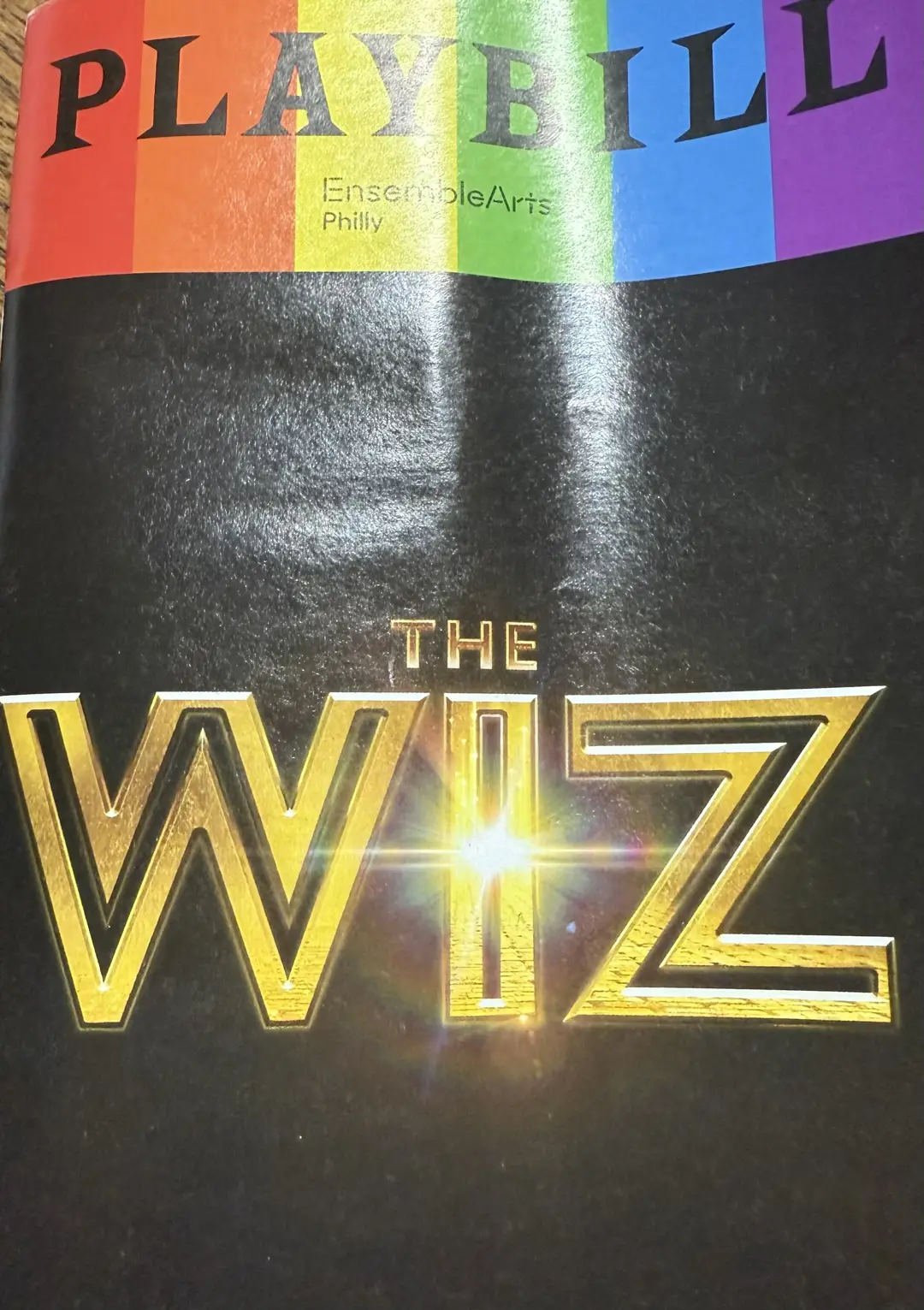 The magical finale of The Wiz - climactic scene showing the full cast on stage in elaborate costumes during the triumphant conclusion of the musical, with dramatic lighting illuminating the Academy of Music theater